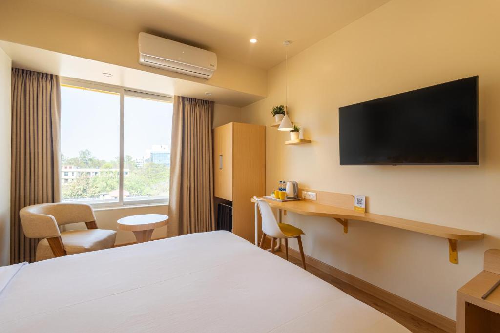 TV a/nebo společenská místnost v ubytování Bloom Hotel - Ranchi
