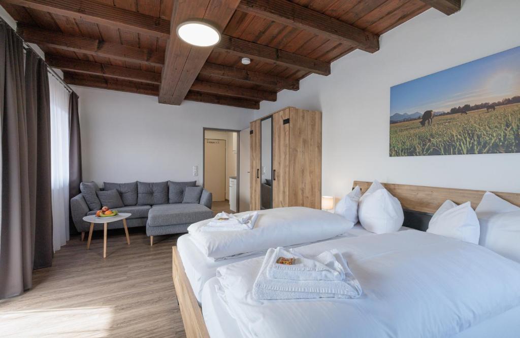 Postel nebo postele na pokoji v ubytování Gästehaus Köpf