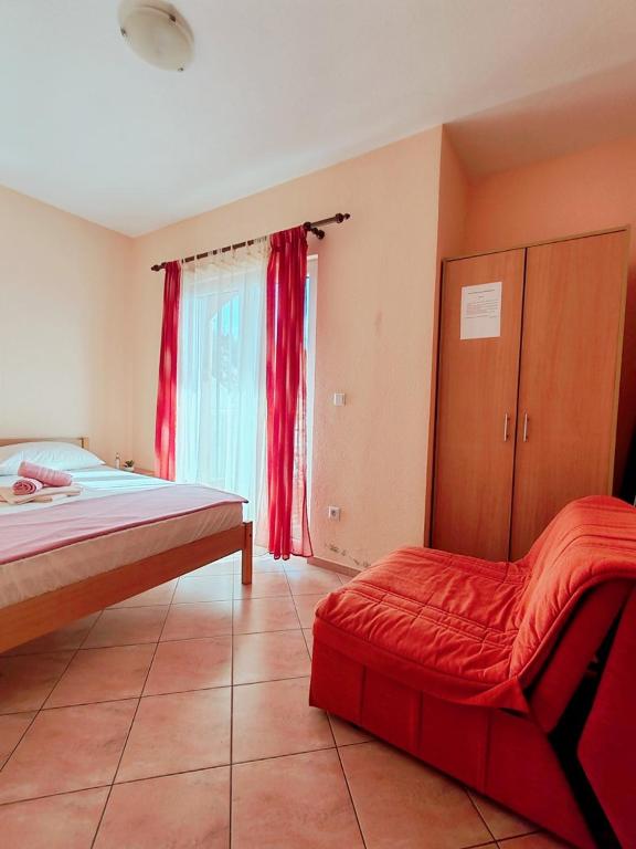 Postel nebo postele na pokoji v ubytování Apartments Draženka
