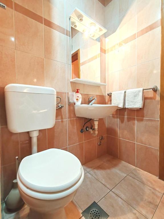 Koupelna v ubytování Apartments Draženka