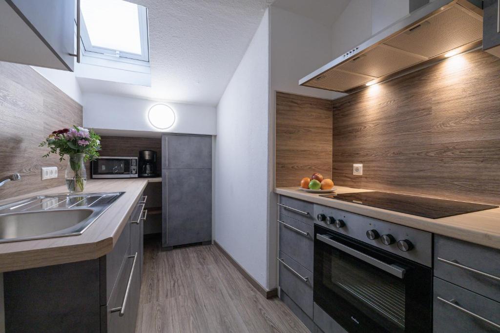 Kuchyň nebo kuchyňský kout v ubytování Gästehaus Köpf