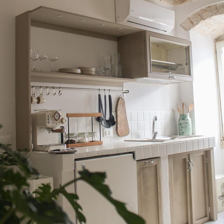 Kuchyň nebo kuchyňský kout v ubytování MAJA Ostuni Centro - Holiday Apartment