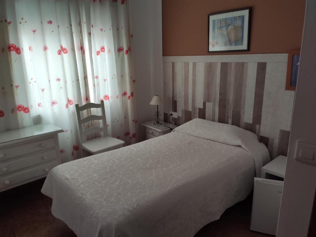 Postel nebo postele na pokoji v ubytování Hostal Ana - Adults Recommended
