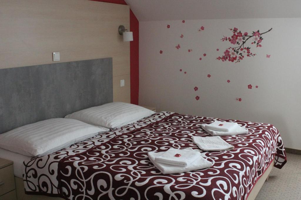 Postel nebo postele na pokoji v ubytování Apartments Verona Karlovy Vary