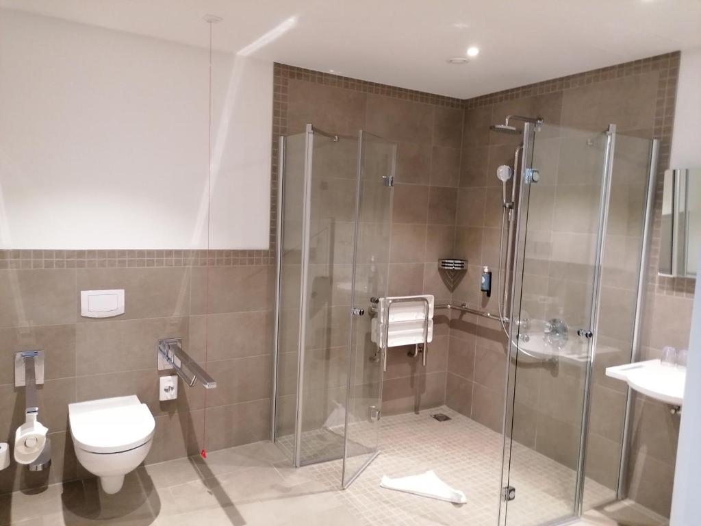 Koupelna v ubytování Hotel Grohnder Fährhaus