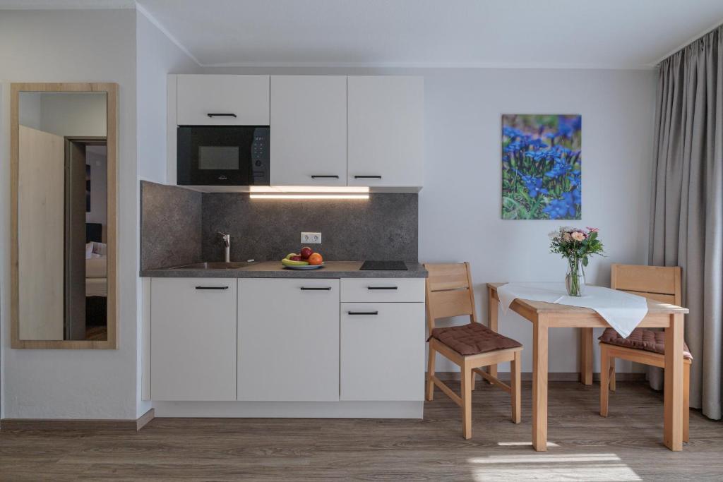 Kuchyň nebo kuchyňský kout v ubytování Gästehaus Köpf