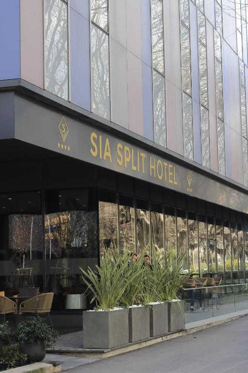 a building with a sign for a silla split hotel at Sia Split Hotel in Split