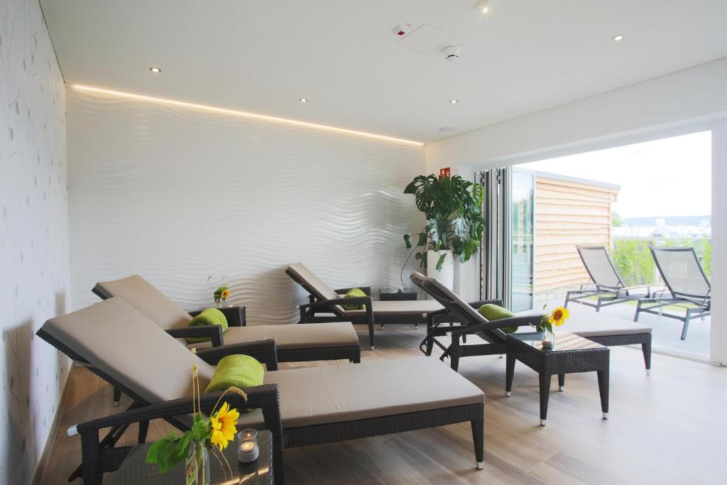 Posezení v ubytování Hotel Grohnder Fährhaus