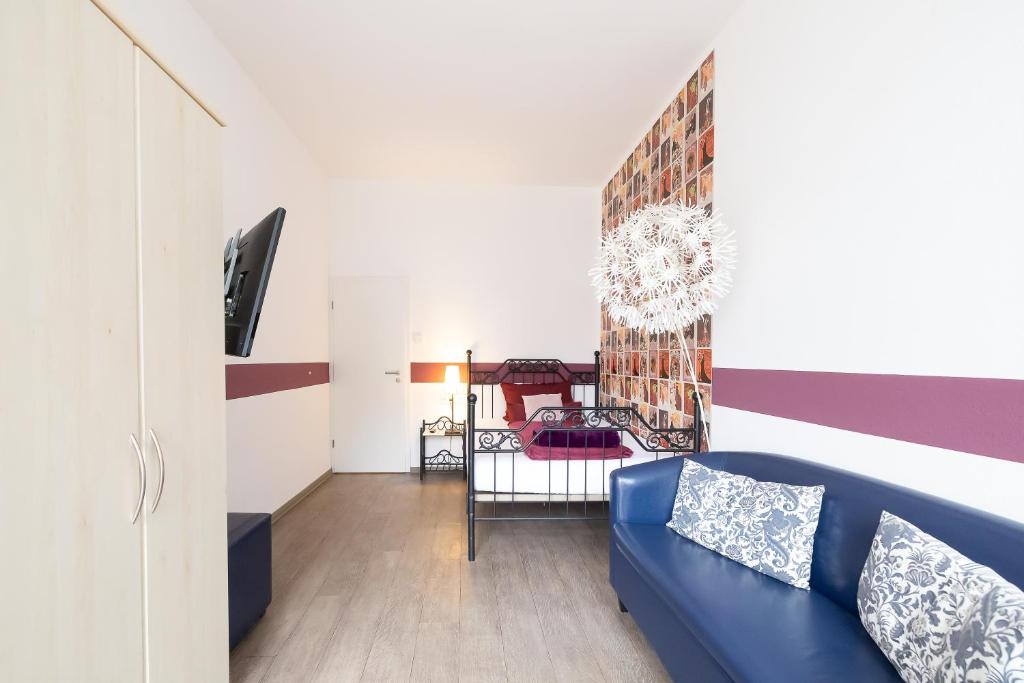 TV a/nebo společenská místnost v ubytování Hotel DAH-Inn