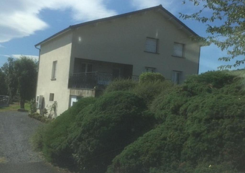 a house on the side of a hill at Un havre de paix à la campagne près Vulcania in La Goutelle