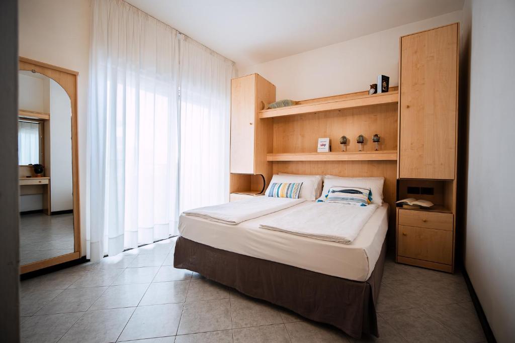 Postel nebo postele na pokoji v ubytování Hotel Niagara