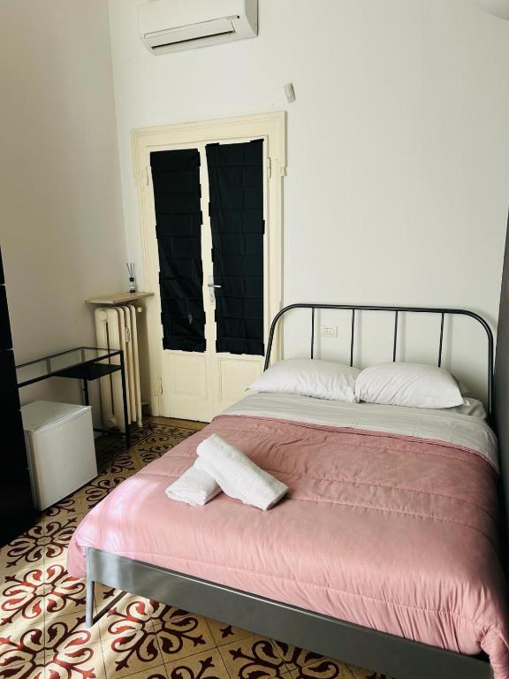 Postel nebo postele na pokoji v ubytování Hostel Boutique