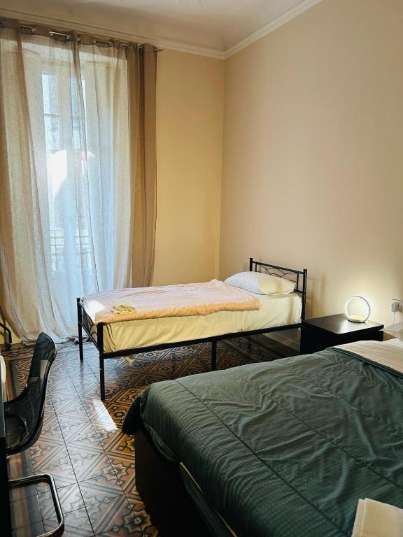 Postel nebo postele na pokoji v ubytování Hostel Boutique