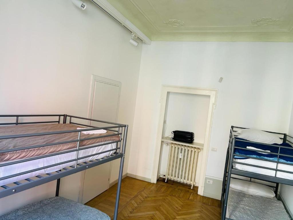 Postel nebo postele na pokoji v ubytování Hostel Boutique