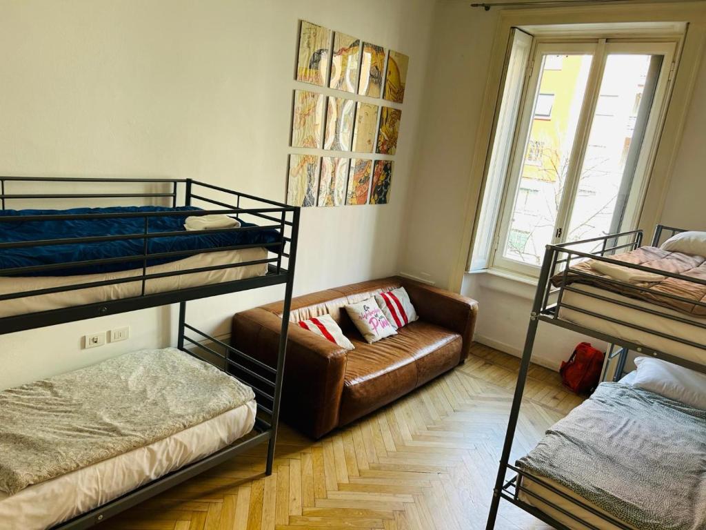 Postel nebo postele na pokoji v ubytování Hostel Boutique