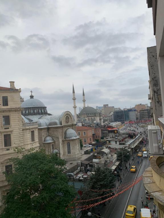 a view of a city with buildings and mosques at MyHouseBosphorus in Istanbul