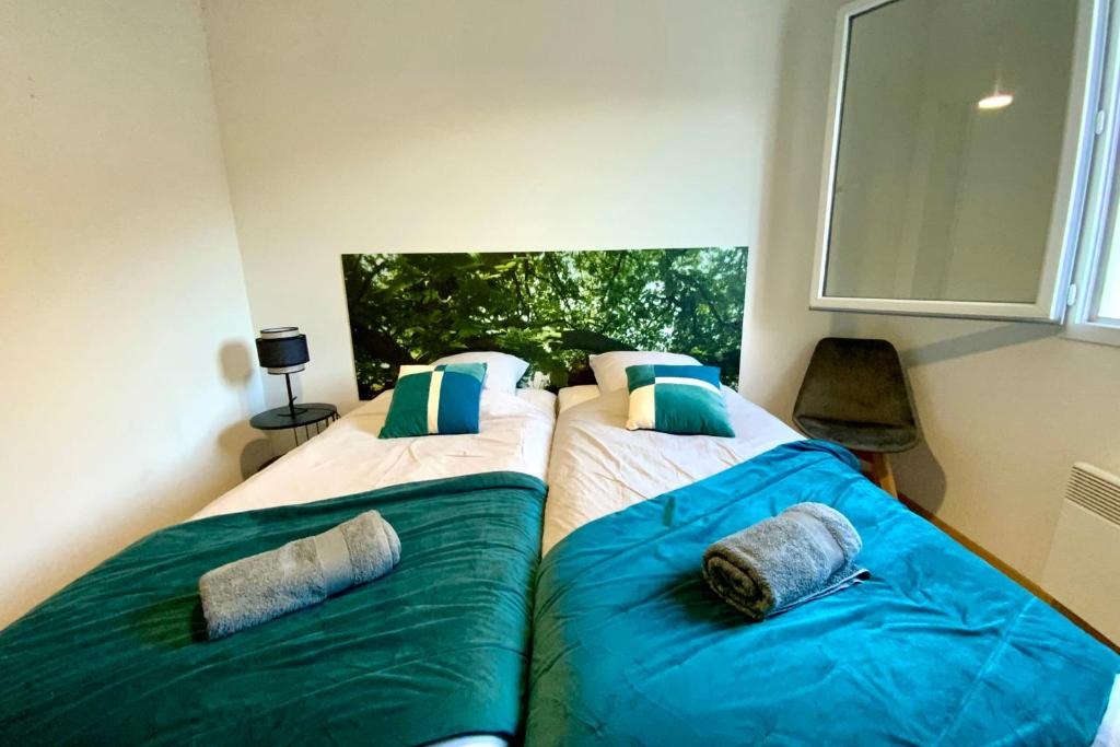 S&auml;ng eller s&auml;ngar i ett rum p&aring; G36 Les Na&iuml;ades- 2 bedrooms for 5 people !