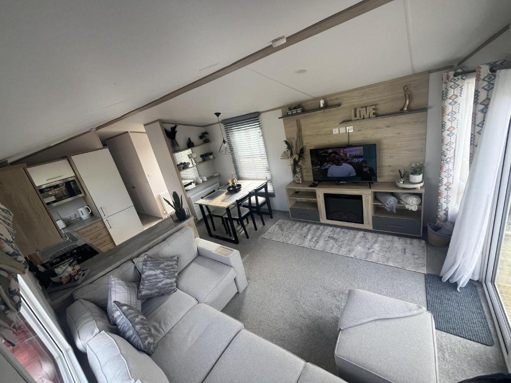 an overhead view of a living room with a couch at 3-Bed Lodge Sleeps 6 Hot tub in Preston