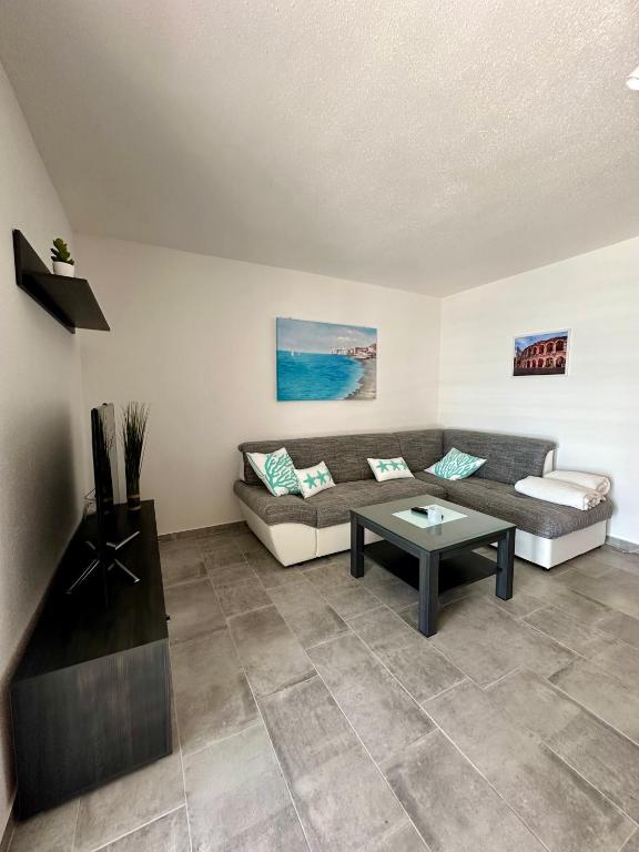 Posezení v ubytování Apartament Sunny Mimice z widokiem na morze