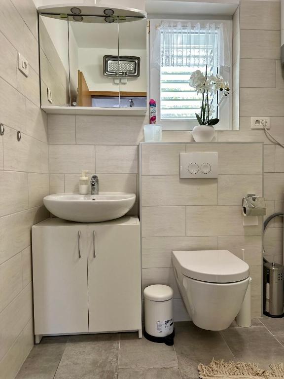 Koupelna v ubytování Apartament Sunny Mimice z widokiem na morze