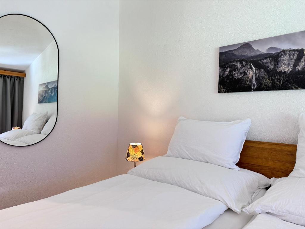 Postel nebo postele na pokoji v ubytování Hotel Restaurant Urweider