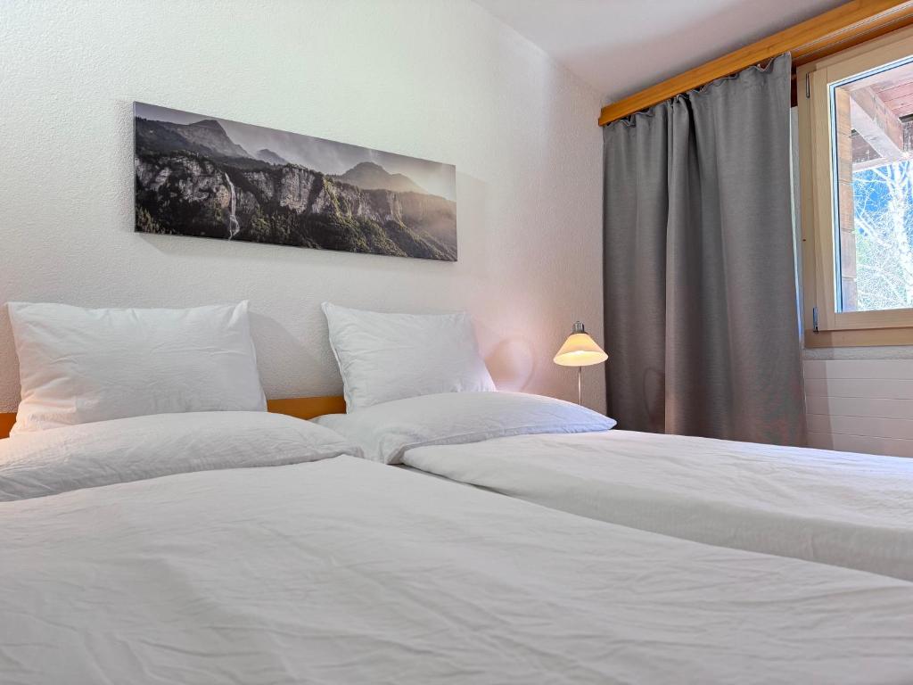 Postel nebo postele na pokoji v ubytování Hotel Restaurant Urweider