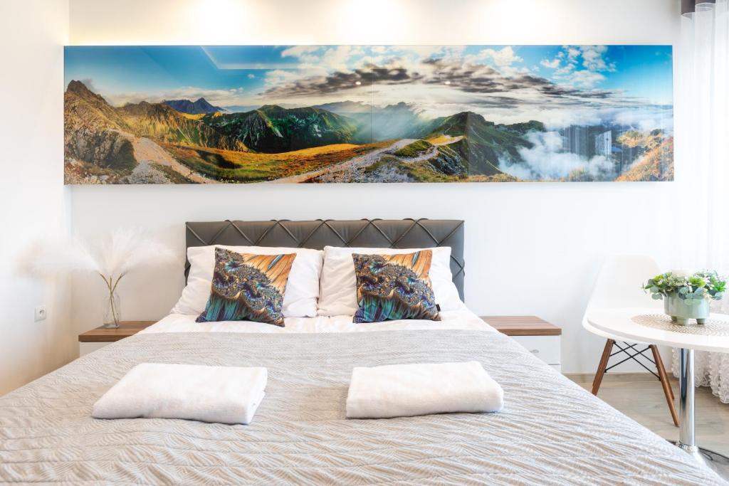 Posteľ alebo postele v izbe v ubytovaní Apartamenty & Spa Stara Polana