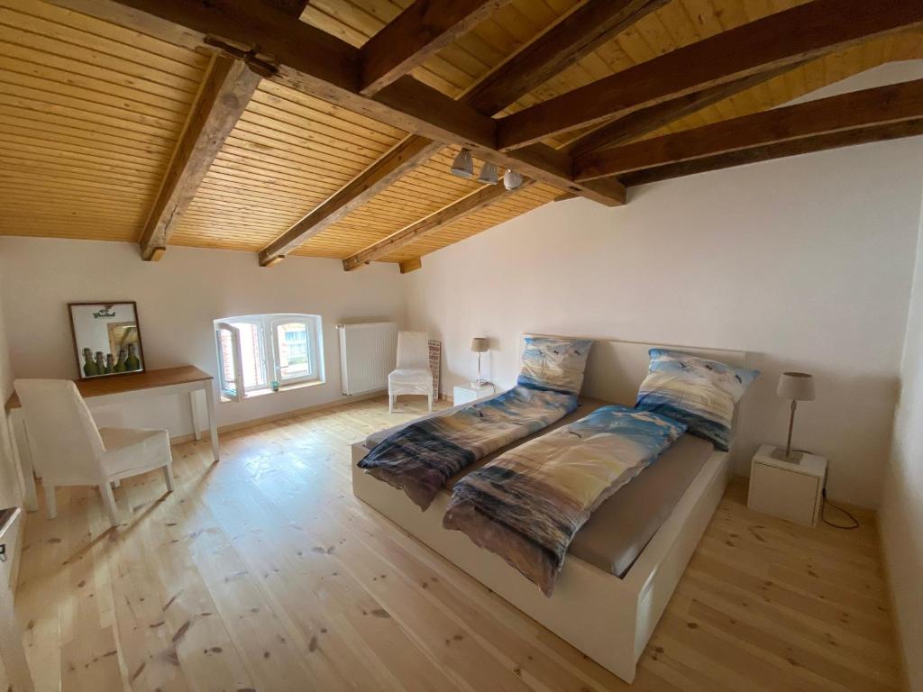 Voodi või voodid majutusasutuse Barther Dachstudio toas