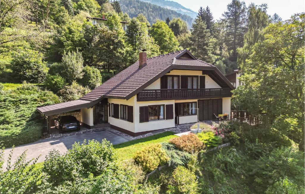 an aerial view of a house in the mountains at Pet Friendly Home In Obervellach With Kitchen in Obervellach