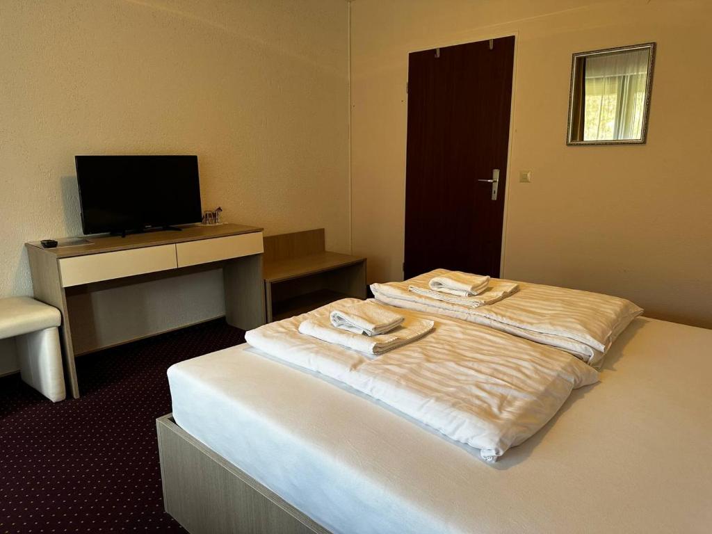 Postel nebo postele na pokoji v ubytování Schwanen-Resort