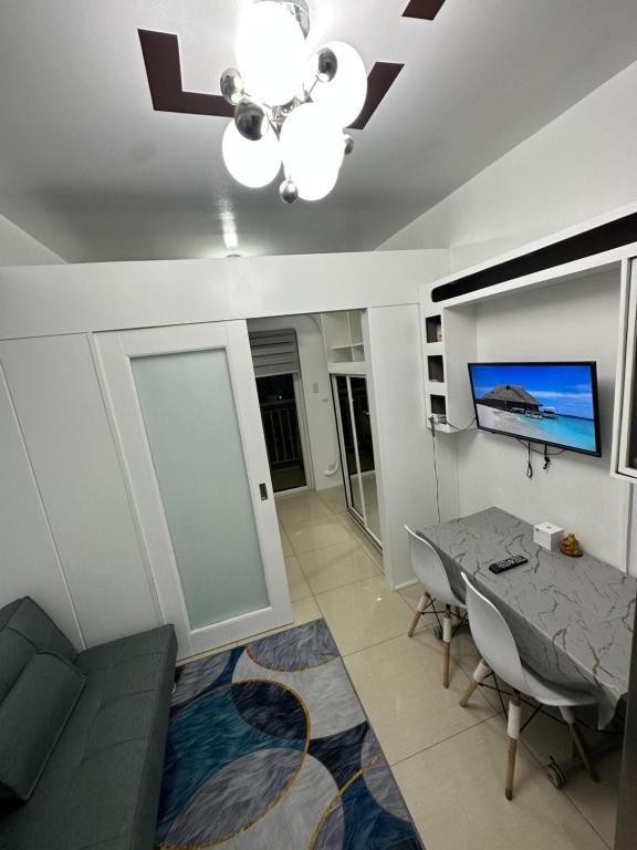 TV a/nebo společenská místnost v ubytování Shell Residences Staycation