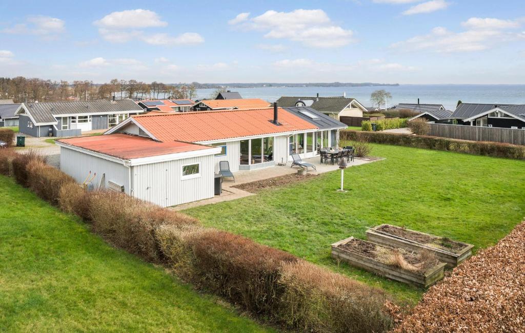 an aerial view of a house with a yard at Cozy Home In Sjølund With Sauna in Sjølund
