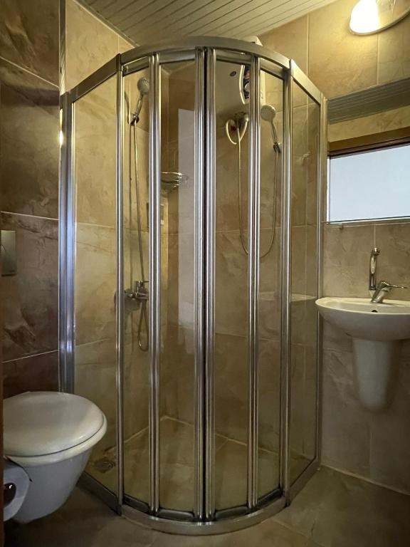 Koupelna v ubytování Held Hotel