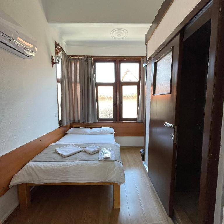Postel nebo postele na pokoji v ubytování Held Hotel
