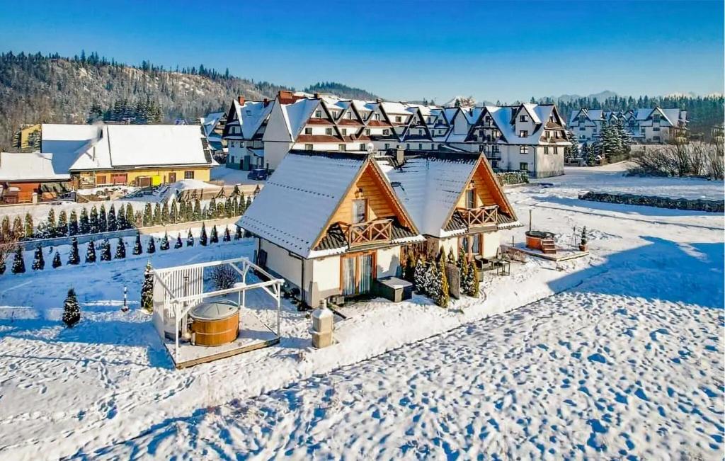 an aerial view of a house in the snow at Awesome Home In Poronin With Kitchen in Poronin