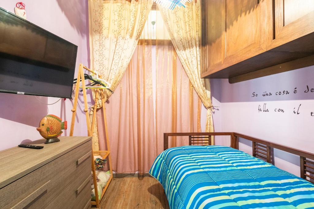 Postel nebo postele na pokoji v ubytování Piccolo e intimo centro città