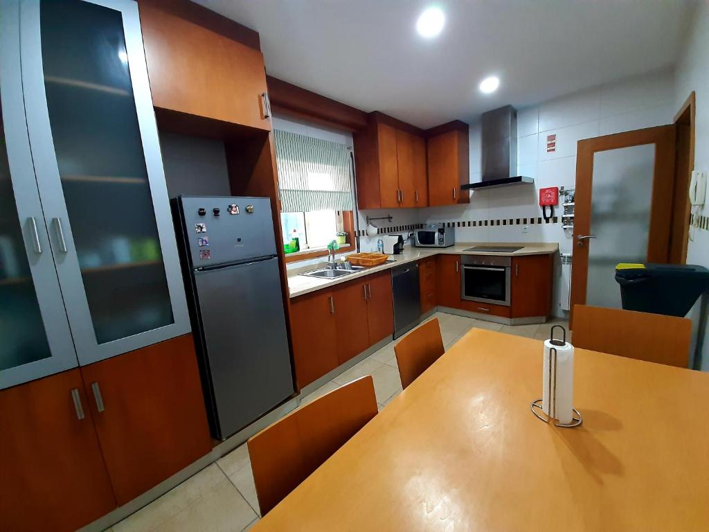 Kuchyň nebo kuchyňský kout v ubytování Casa do Vale