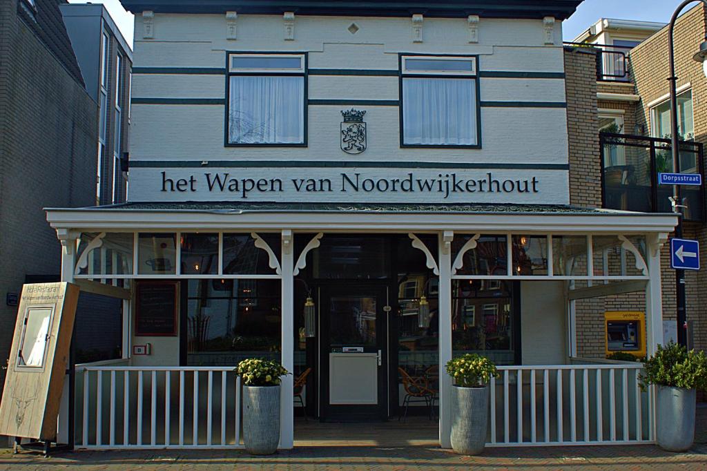 een hete golf van nororenorenstrationstraties rationstraties rationstratie bij Het Wapen van Noordwijkerhout in Noordwijkerhout