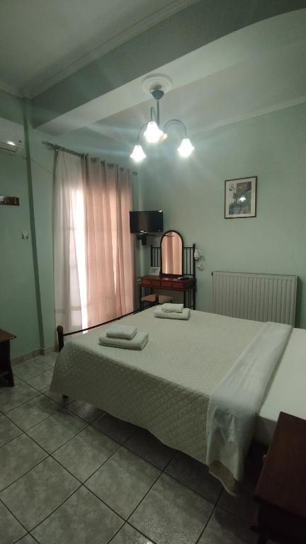 Postel nebo postele na pokoji v ubytování AGNANTIO