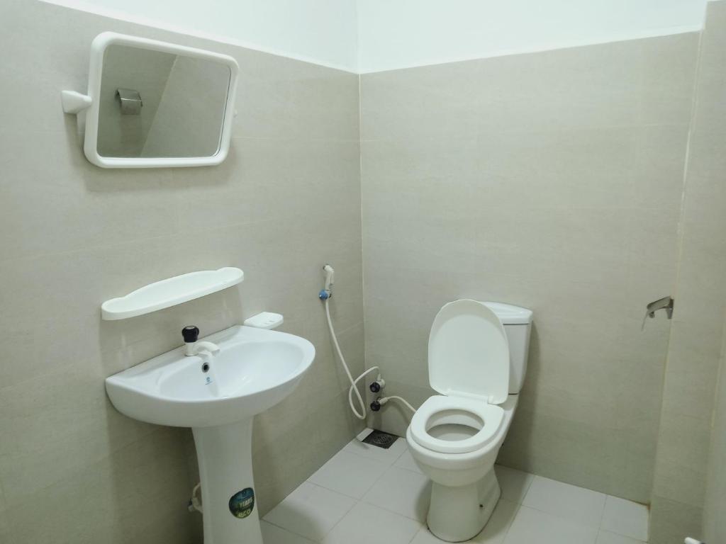 Koupelna v ubytování White Villa Hotel