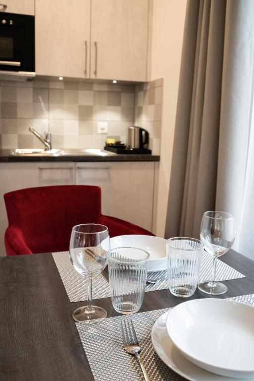 Kuchyň nebo kuchyňský kout v ubytování Motel-Résidence Ô Pied à Terre