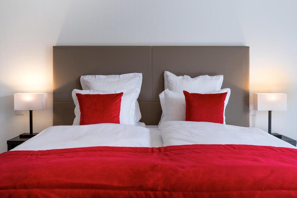 Postel nebo postele na pokoji v ubytování Motel-Résidence Ô Pied à Terre