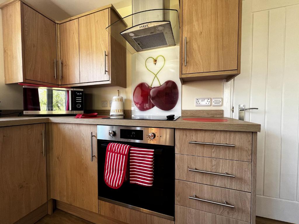 Kuchyň nebo kuchyňský kout v ubytování Cherry Lodge