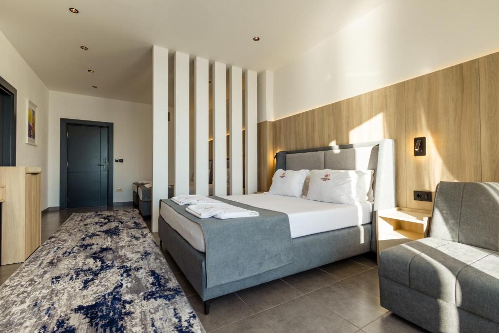 Postel nebo postele na pokoji v ubytování Continental Hotel