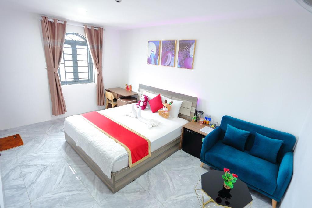 Postel nebo postele na pokoji v ubytování SKY HOTEL