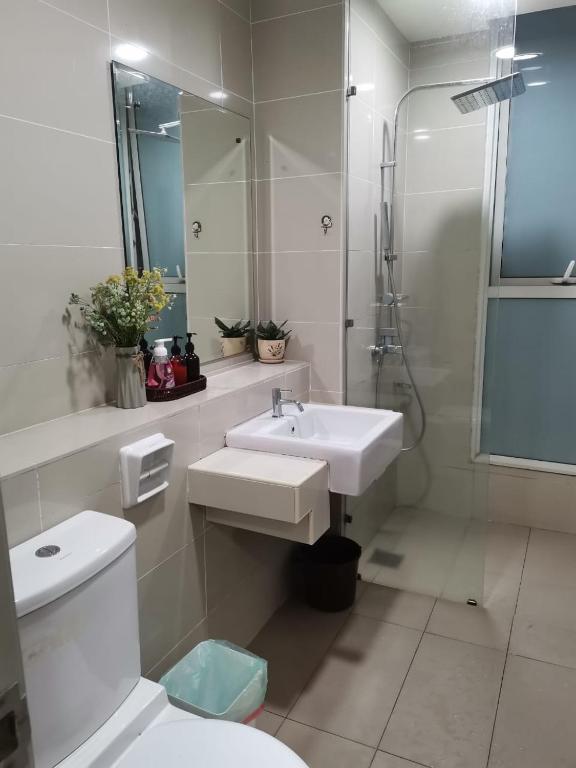 Koupelna v ubytování Sutera Avenue - Jom Summer Suite