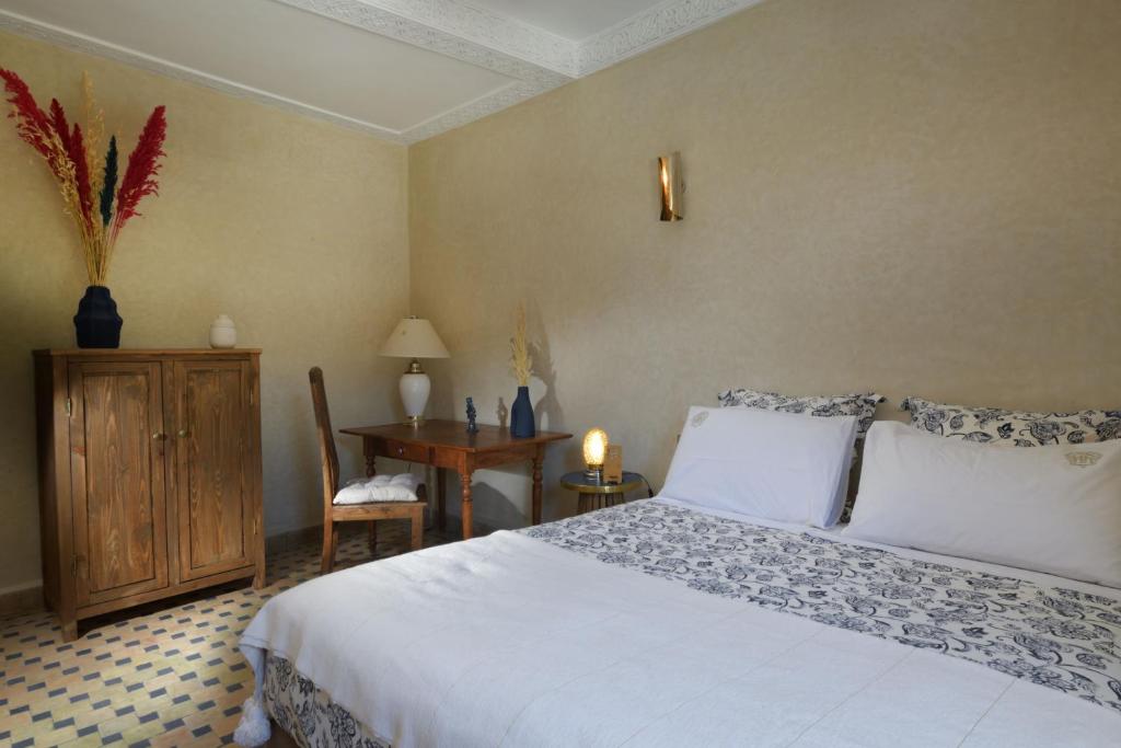 Postel nebo postele na pokoji v ubytování Riad Palau Marrakech