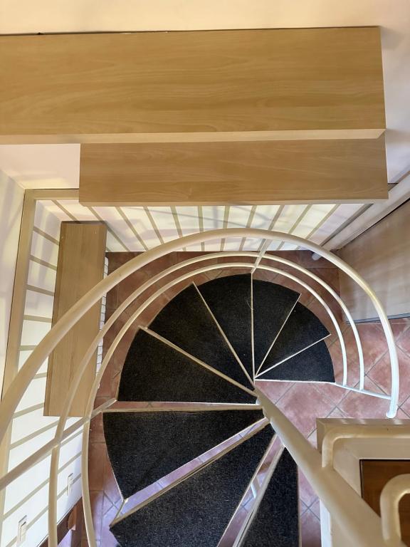 a view of a spiral staircase in a house at Casa Bonita in Caserta
