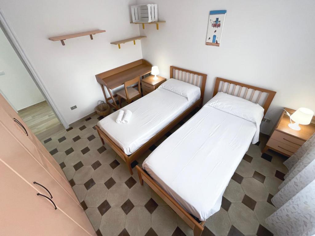 Postel nebo postele na pokoji v ubytování Villa Dino