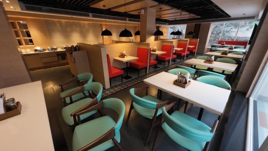 Posezení v ubytování HOTEL SURYA GRAND